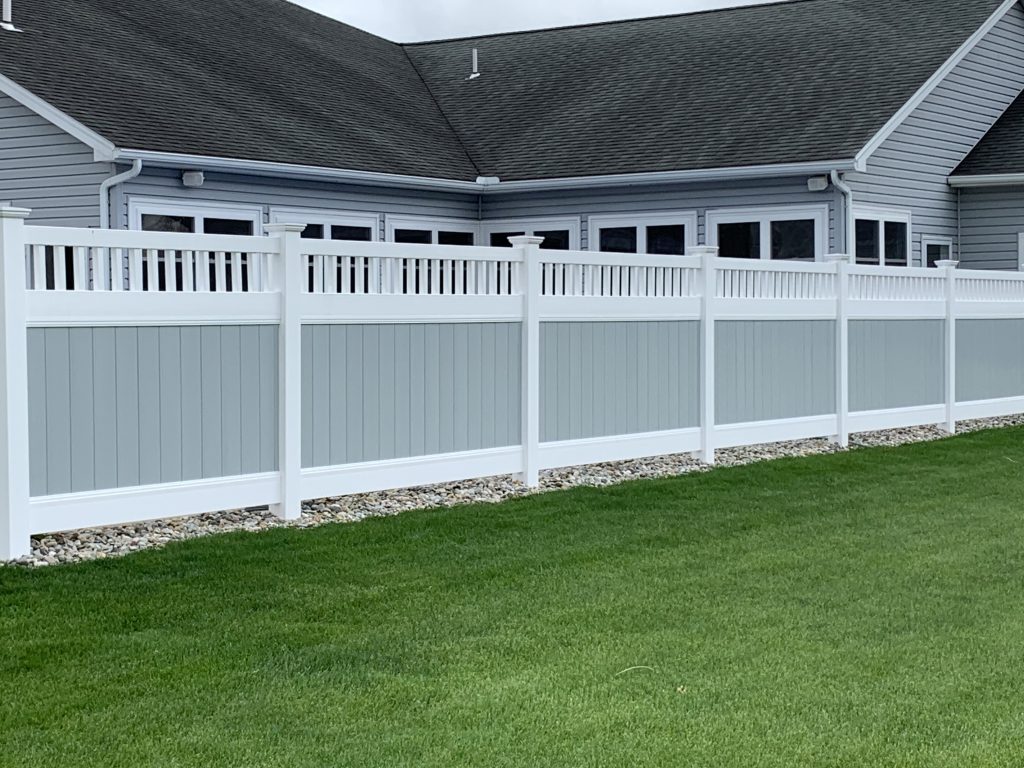 white and grey vinyl fence